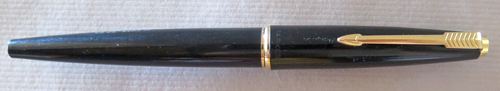#6424 & 6425: ENGLISH MADE PARKER 45 IN BLACK. PLACTIC CAP WITH GOLD PLATED TRIM. 6424 HAS MED NIB. 6425 HAS BROAD NIB + CLEAR ORIGIONAL CHALK MARK "45 DE-LUX M".